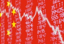 China’s state banks cut deposit rates for first time since 2015