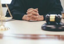 Goldman’s Top Lawyer Steps Down as Epstein Fallout Claims Another High-Profile Career